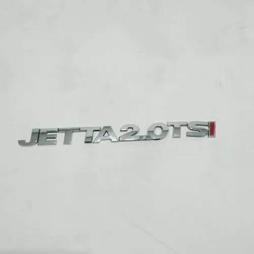 Emblema Da Tampa Traseira Jetta 2.0 Tsi 2012 Cod 58975