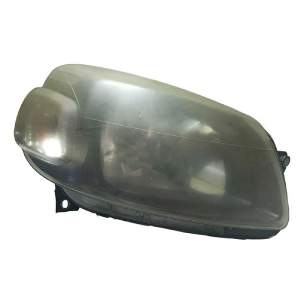 Farol Direito Fiat Uno Sport 2012 (detalhe). Direito/passageiro